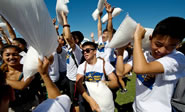  UC Irvine students broke the Guinness World Record for largest pillow fight. The event attracted 4,200 participants. UCI seized the title for world's largest pillow fight from Dada Life. Photo by Steve Zylius, UC Irvine Communications.