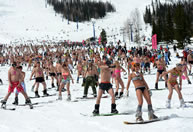 Seven hundred skiers and snowboarders in swimsuits hit the slopes of Mount Zelenaya at the Sheregesh ski resort in Siberia to set a new world bikini parade record. Each of the 1,835 participants took the frivolous ride seriously, with special observers making certain no one was wearing a slip of cloth too much.
