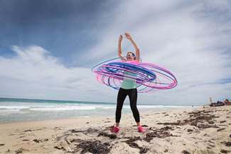  Hula hoop coach Bree Kirk-Burnnand smashed the world record for most hoops spun at once. 