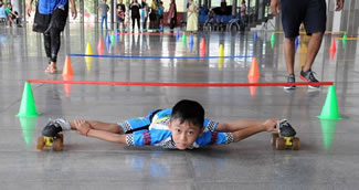  A nine-year-old Indian boy from Manipur, northeast India, has set a new World Record in limbo skating. Tiluck Keisam skated beneath 146 bars over a 145-meter stretch in just 56.01 seconds.